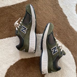 Olive green new balance 2002R size 7 in men’s 8.5 women’s
